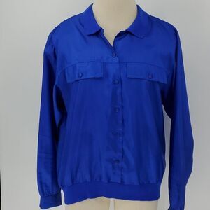 Lauren Lee,  royal blue blouse,  size large, front pockets. Polyester..